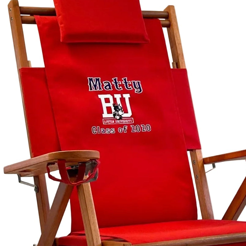Red folding Boston University chair with Terriers logo, personalized with a name and graduation date.