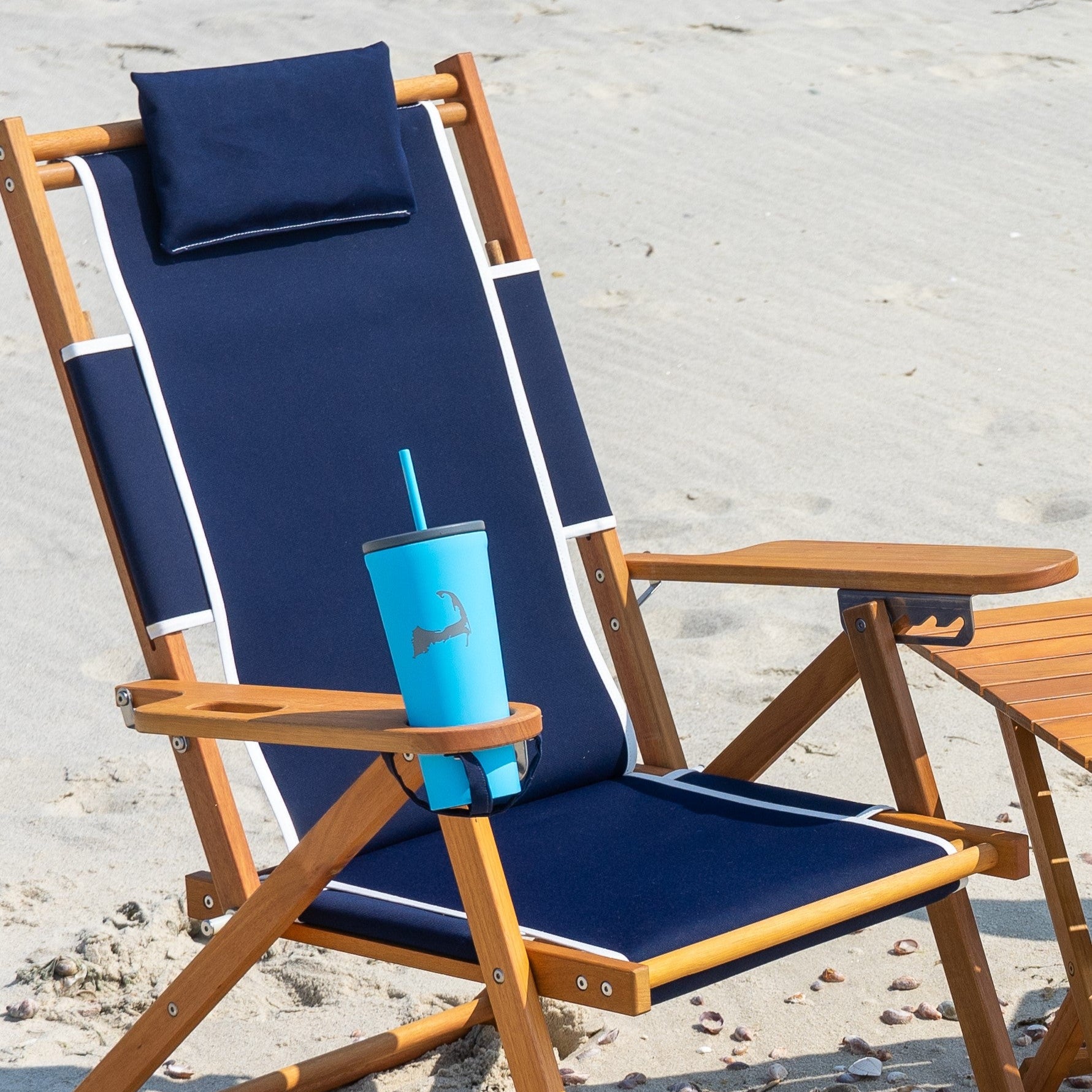 Custom beach chair with cape cod insulated cup in cupholder