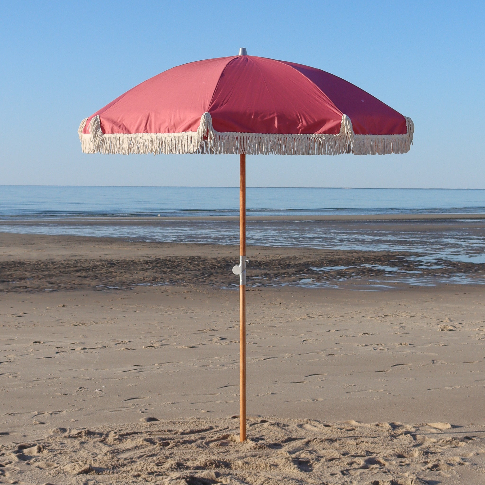 nantucket red beach umbrella with cotton tassels