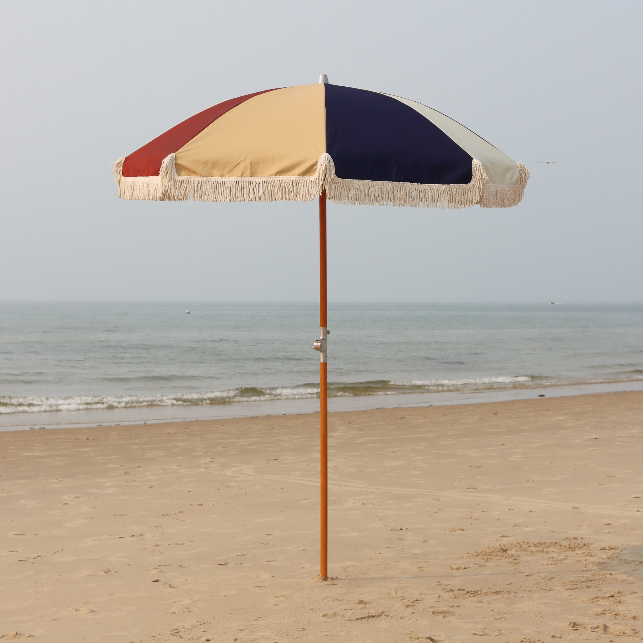 Maroon gold navy and white multicolor panel beach umbrella with cotton fringe