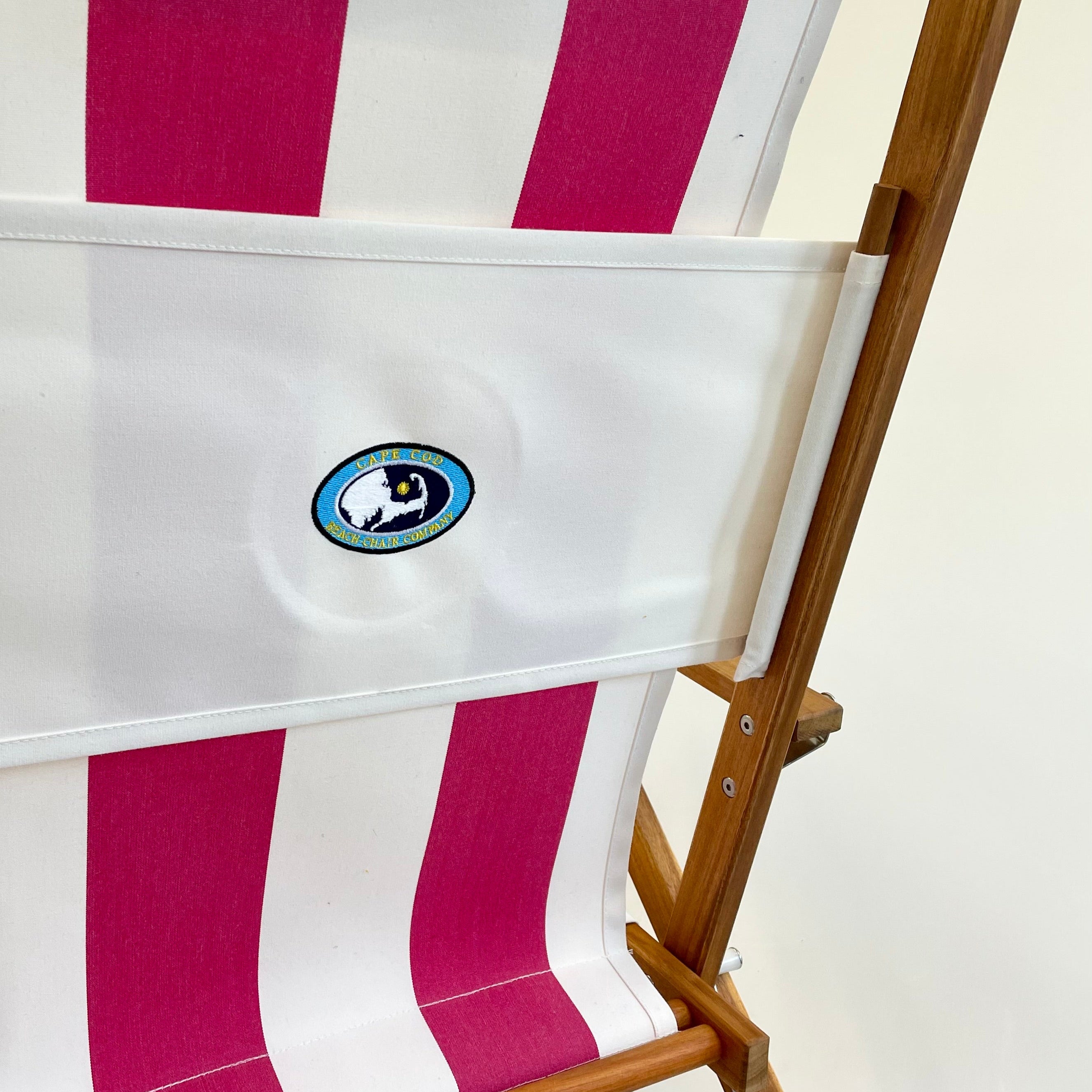 Custom embroidered pink and white stripe wood beach chair