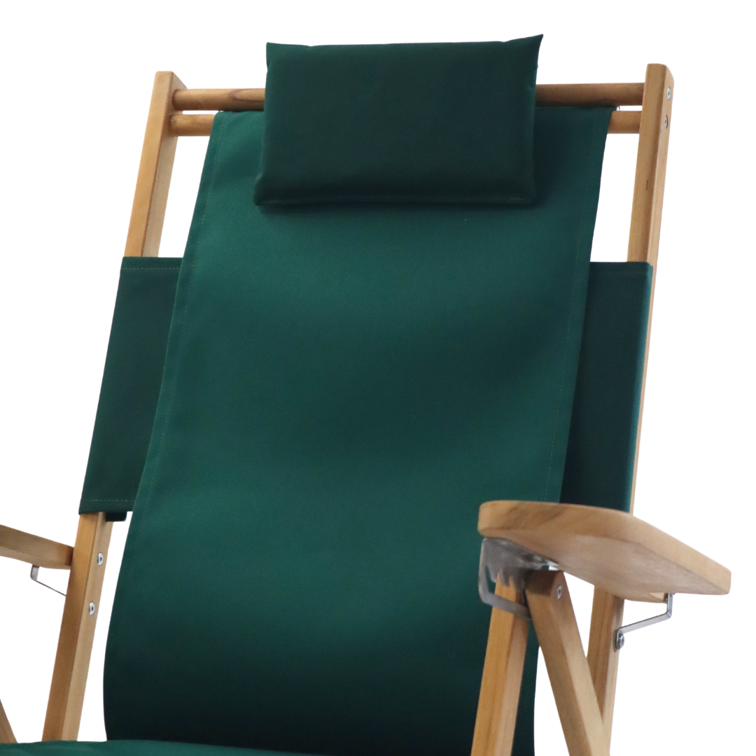 Green lounge chair with wooden armrests and adjustable pillow on a white background