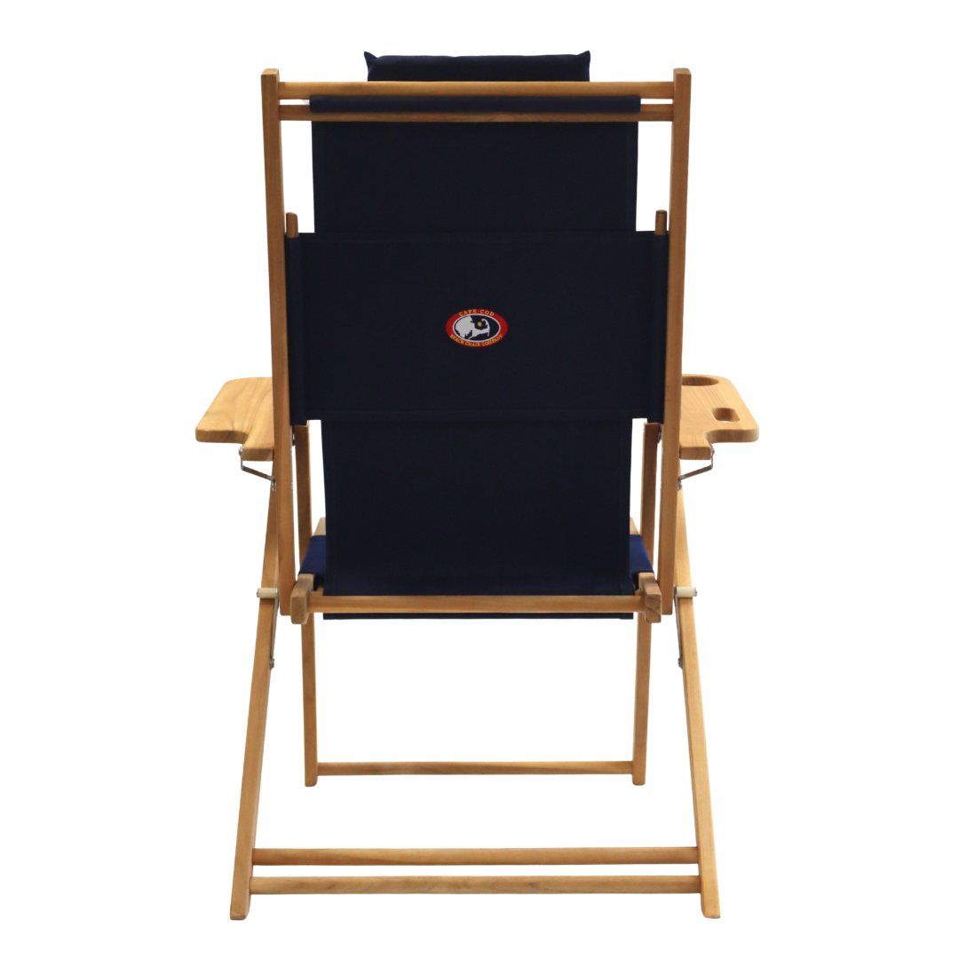 Wooden deck chair with navy blue canvas and logo on a white background