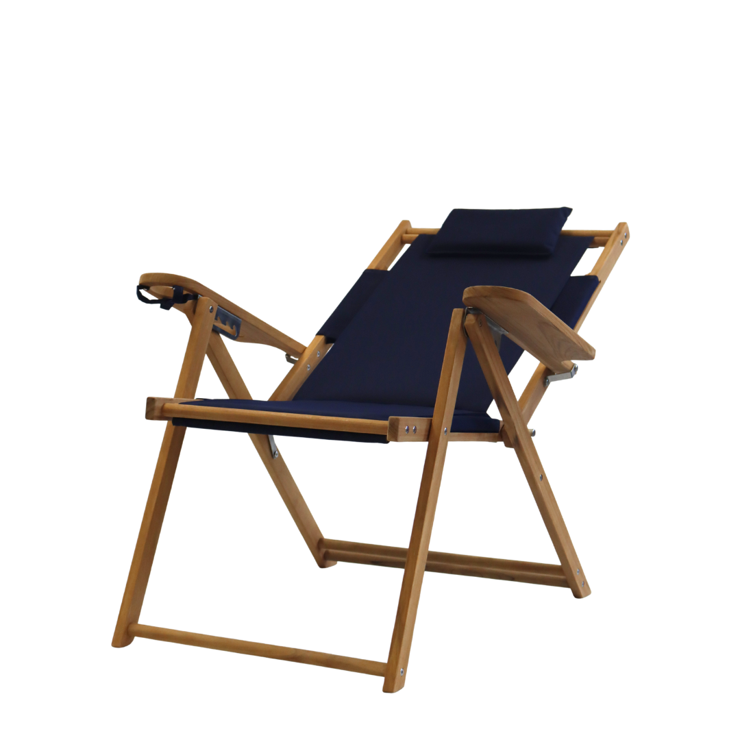 Foldable chair with wooden frame and navy blue fabric reclined