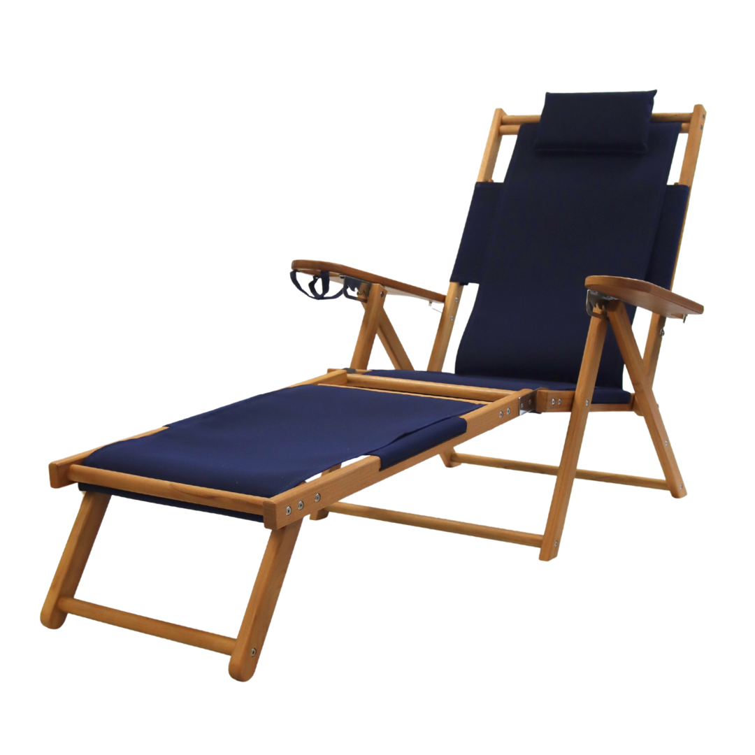 Wooden lounge chair with navy cushions on a white background