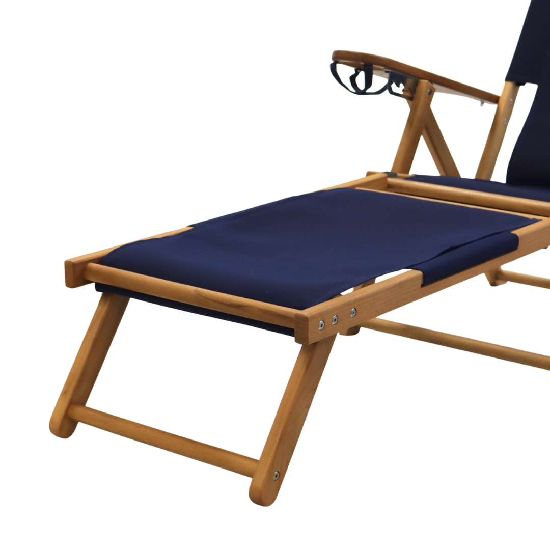 Wooden beach chair with navy blue footrest attachment
