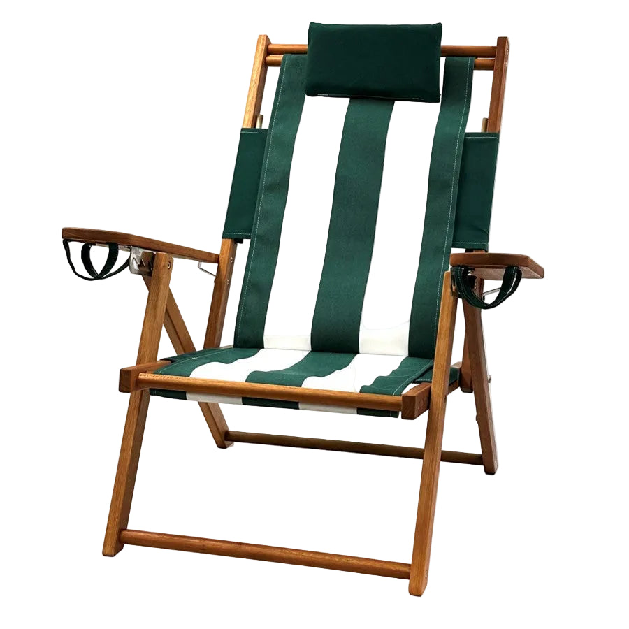 Wooden chair with green and white striped seat and backrest on a white background