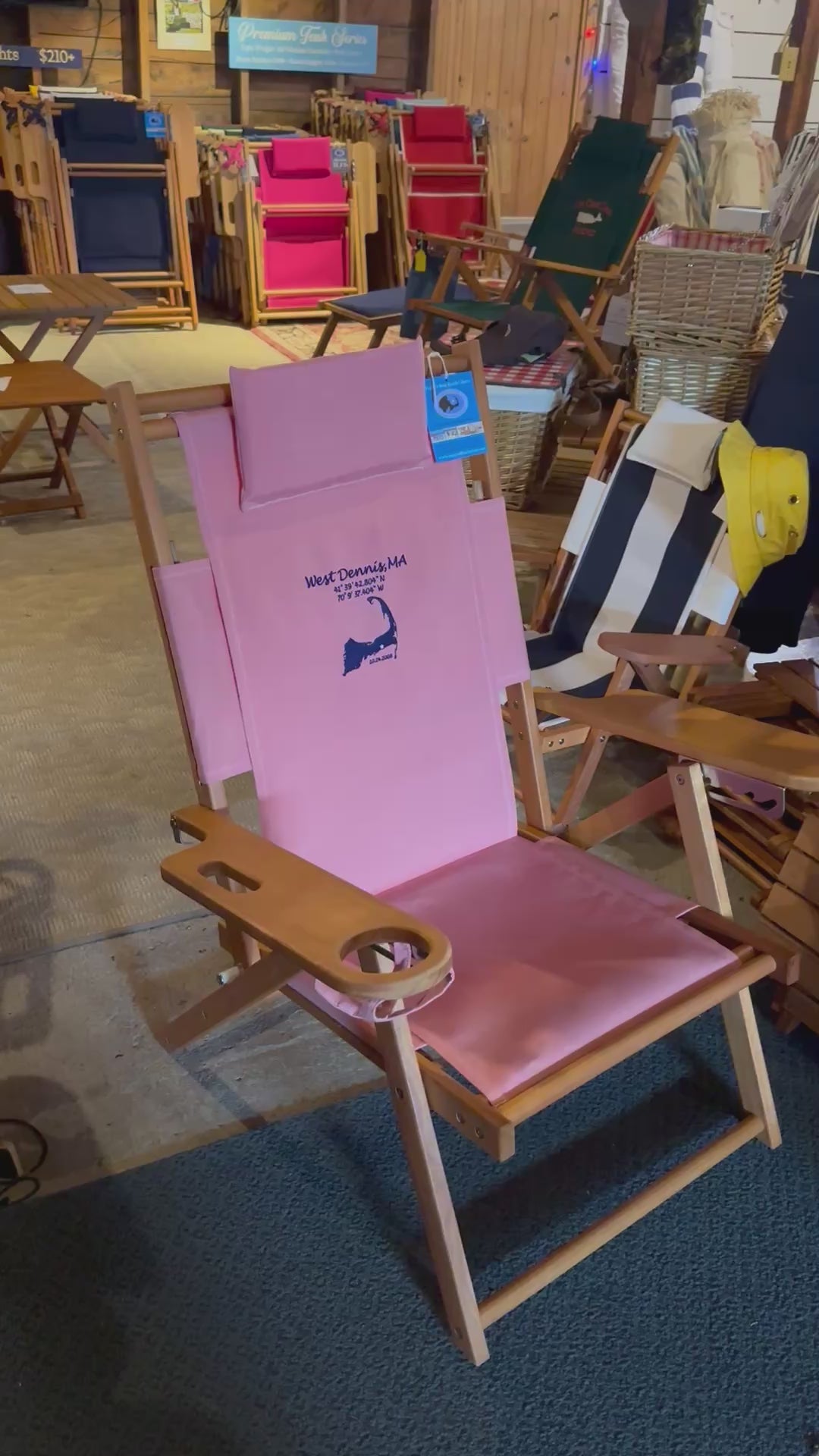 Custom embroidered coral pink beach chair.