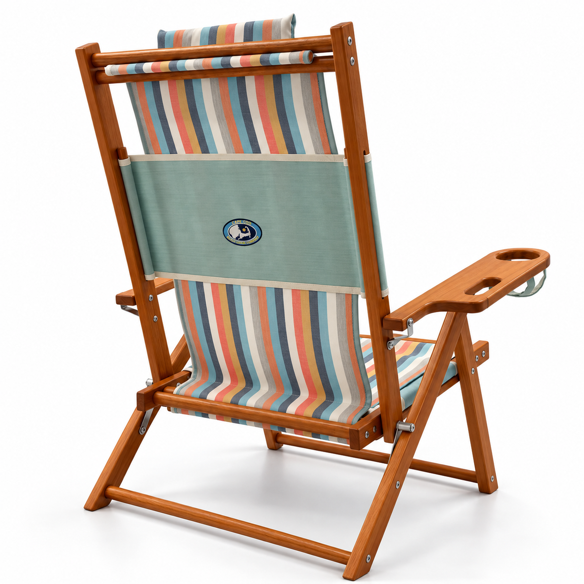 A folding wooden beach chair with a striped fabric sling in pastel blue, orange, pink, and white, featuring a light blue backrest panel with a circular logo and a side armrest cup holder.