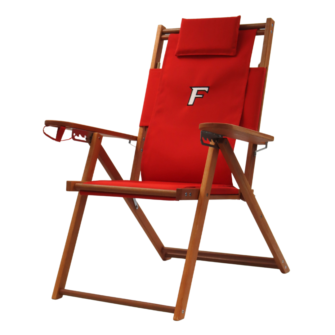 A Fairfield University tall red wood and canvas beach and deck chair.