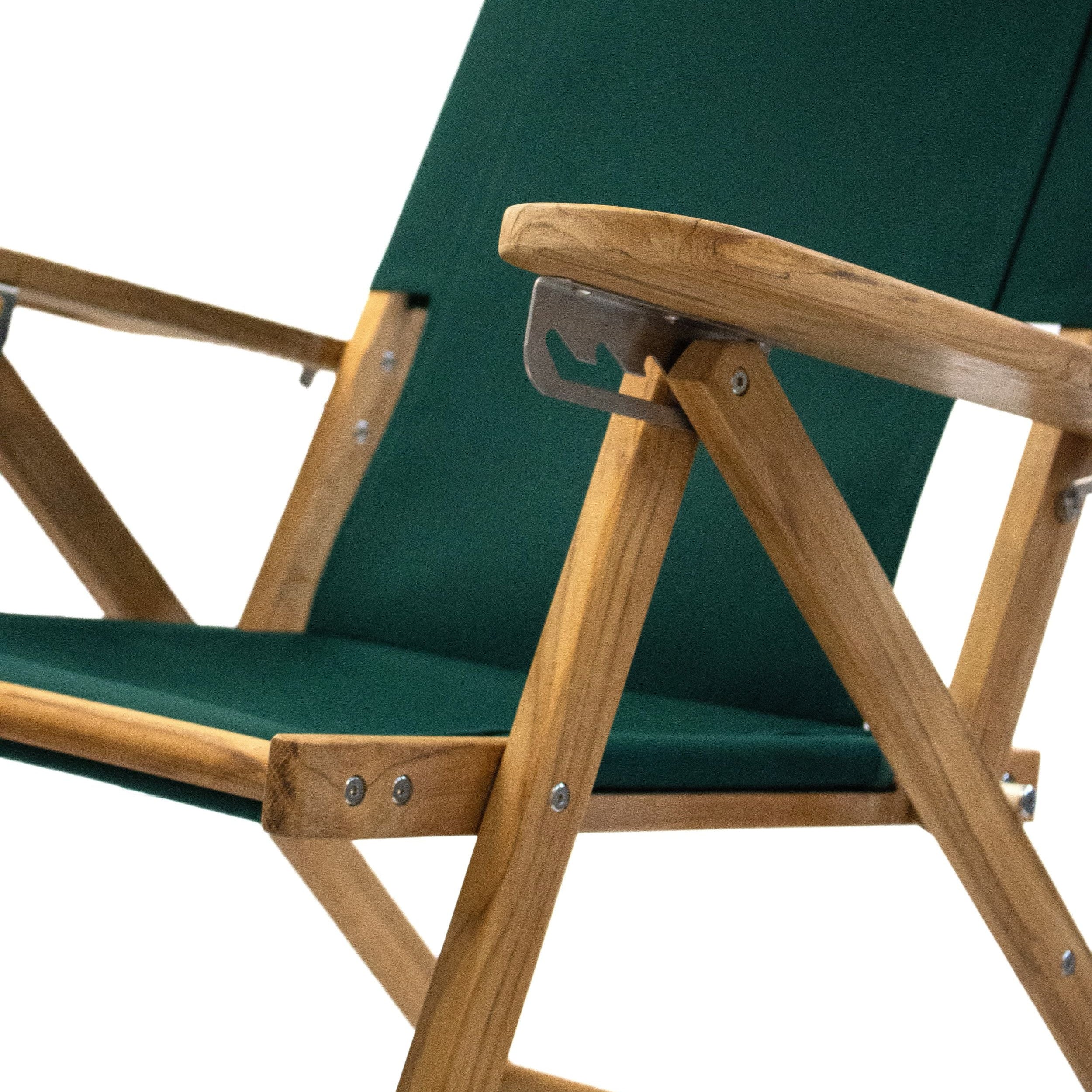 Teak wood folding chair with green fabric