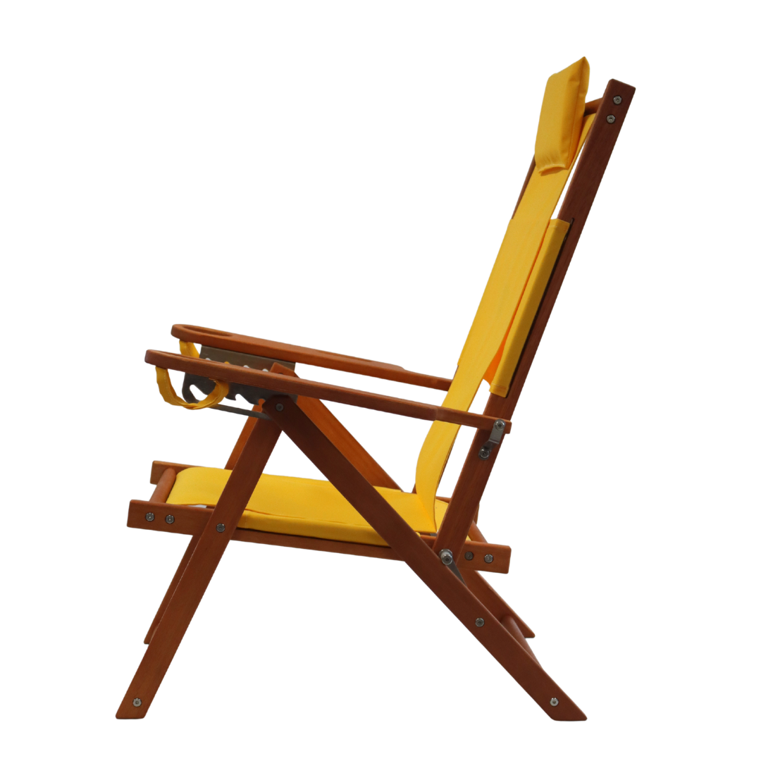 Side view of yellow lounge chair with wooden frame on a white background