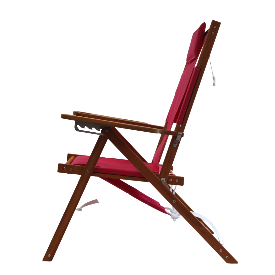Wooden folding beach chair with pink canvas and carrying straps