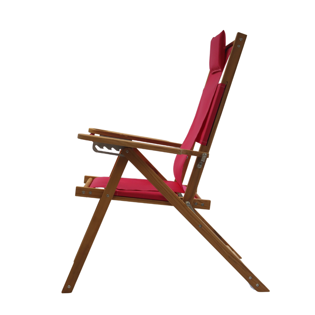 Pink folding beach chair with pink head cushion