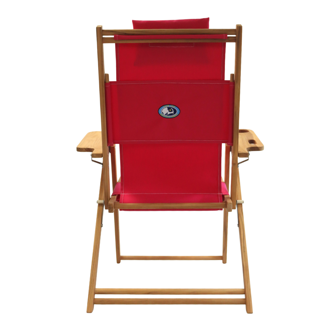 Pink folding chair with wooden frame on a white background